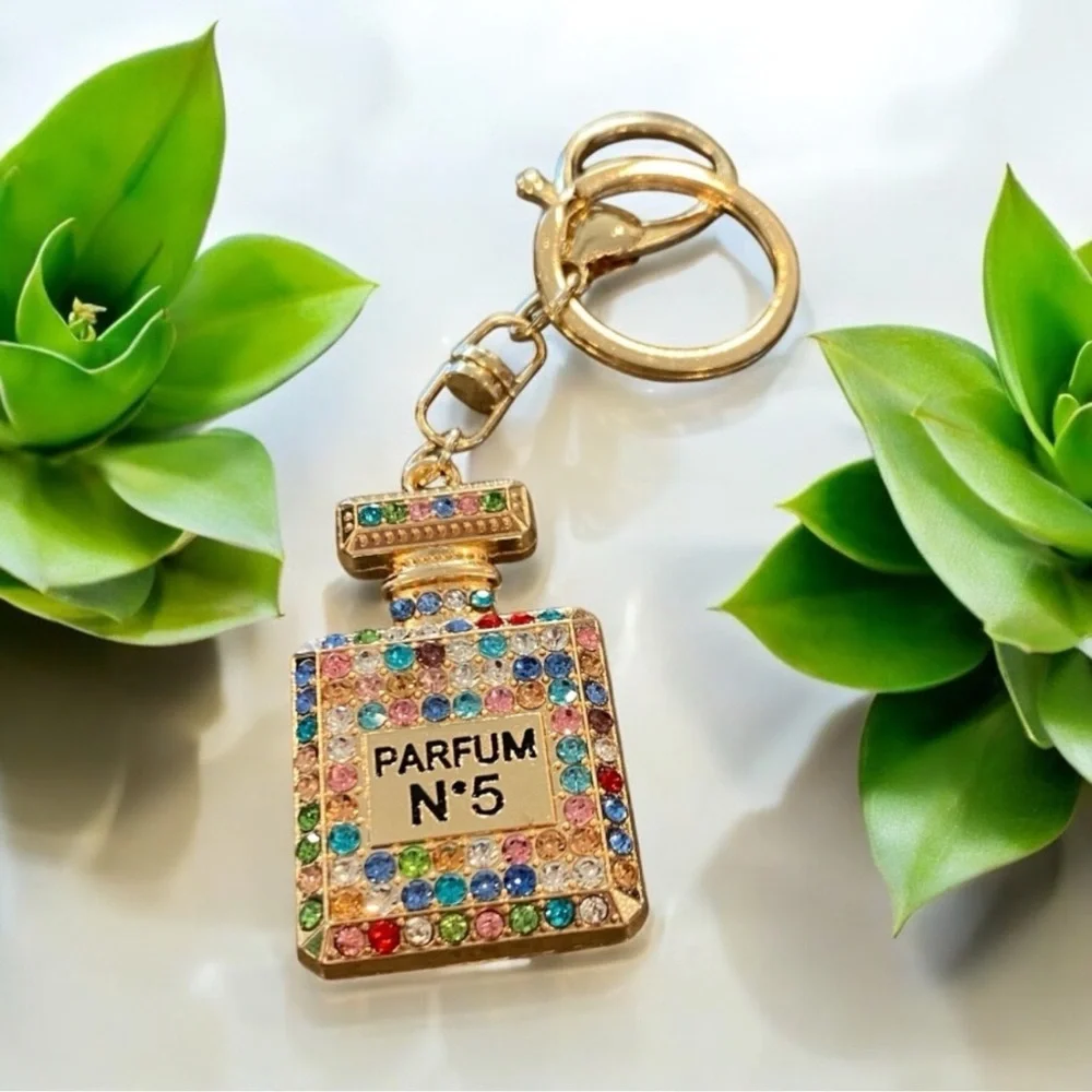 Elegant Rainbow crystal adorned Parfum bottle Goldtone keychain - Picture 1 of 7